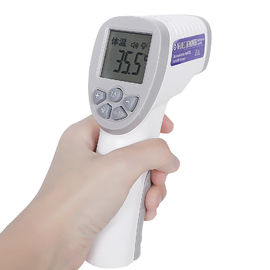 Laser plaçant le thermomètre infrarouge tenu dans la main/thermomètre portatif de front